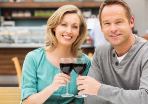 Couple Toasting Wine In Restaurant